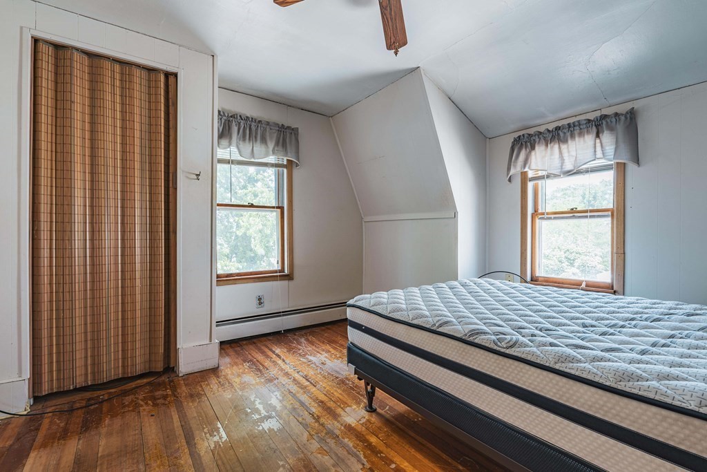 51 Bay Road Revere, MA 02151 - Photo 12 of 34 a bedroom with a bed and a window