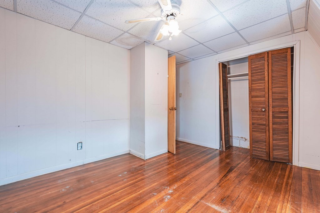 51 Bay Road Revere, MA 02151 - Photo 13 of 34 an empty room with wooden floor and windows