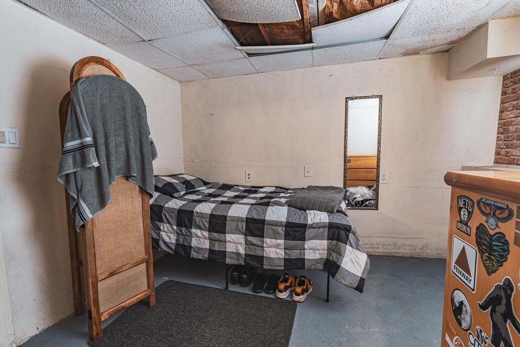 51 Bay Road Revere, MA 02151 - Photo 25 of 34 a bedroom with bed and a window