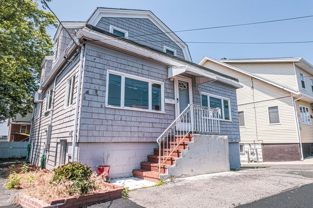 51 Bay Road Revere, MA 02151 - Photo 32 of 34 a front view of a house with a yard
