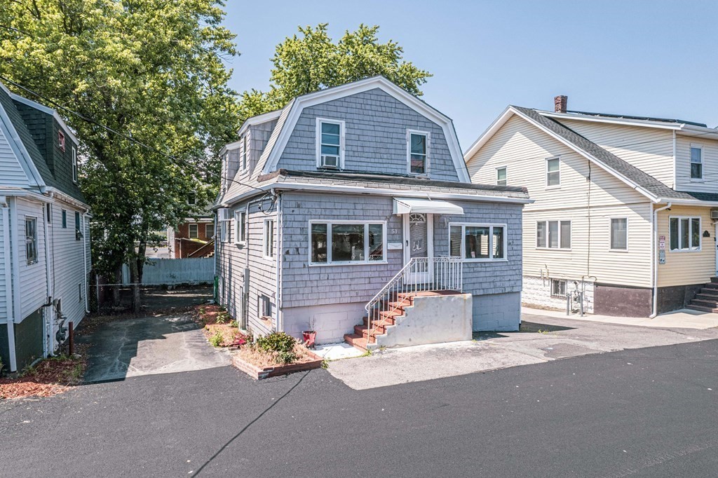 51 Bay Road Revere, MA 02151 - Photo 33 of 34 a front view of a house with a garage