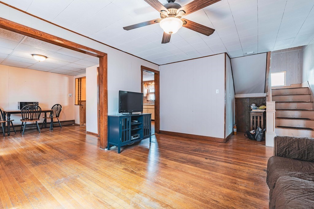 51 Bay Road Revere, MA 02151 - Photo 4 of 34 a living room with furniture and a flat screen tv