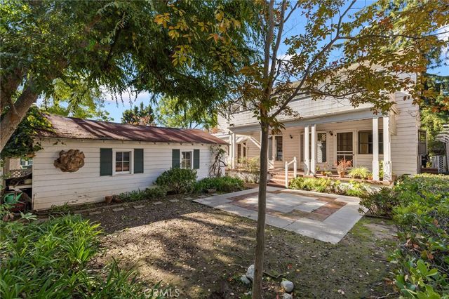 a view of backyard with green space