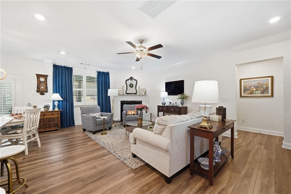 707 Evergreen Lane Canton, GA 30114 - Photo 17 of 59 a living room with furniture a fireplace and a flat screen tv