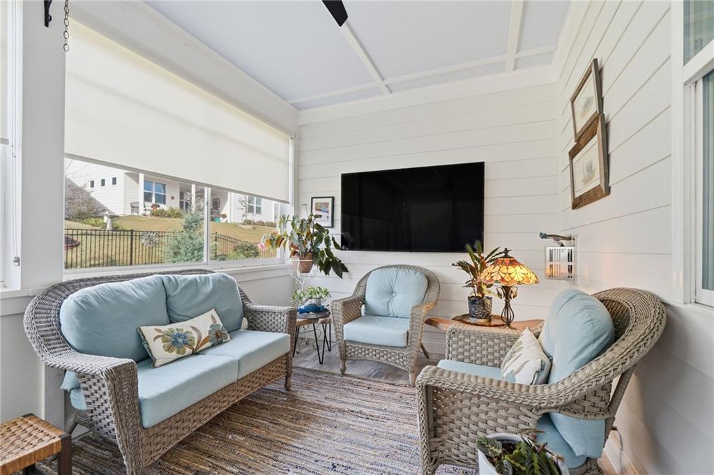 707 Evergreen Lane Canton, GA 30114 - Photo 33 of 59 a living room with furniture and a flat screen tv