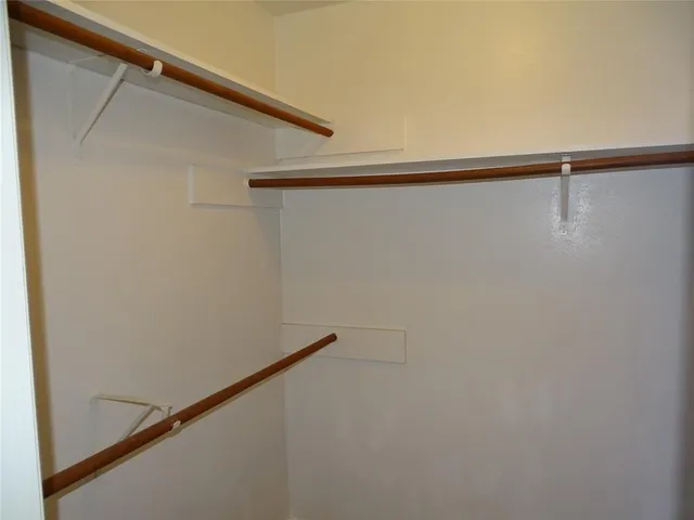 a view of small space with racks on the wall