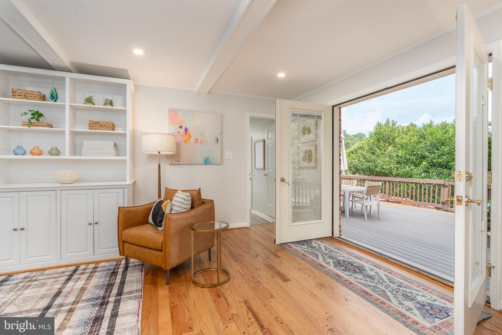8712 Fox Run Potomac, MD 20854 - Photo 15 of 49 a living room with furniture and a floor to ceiling window