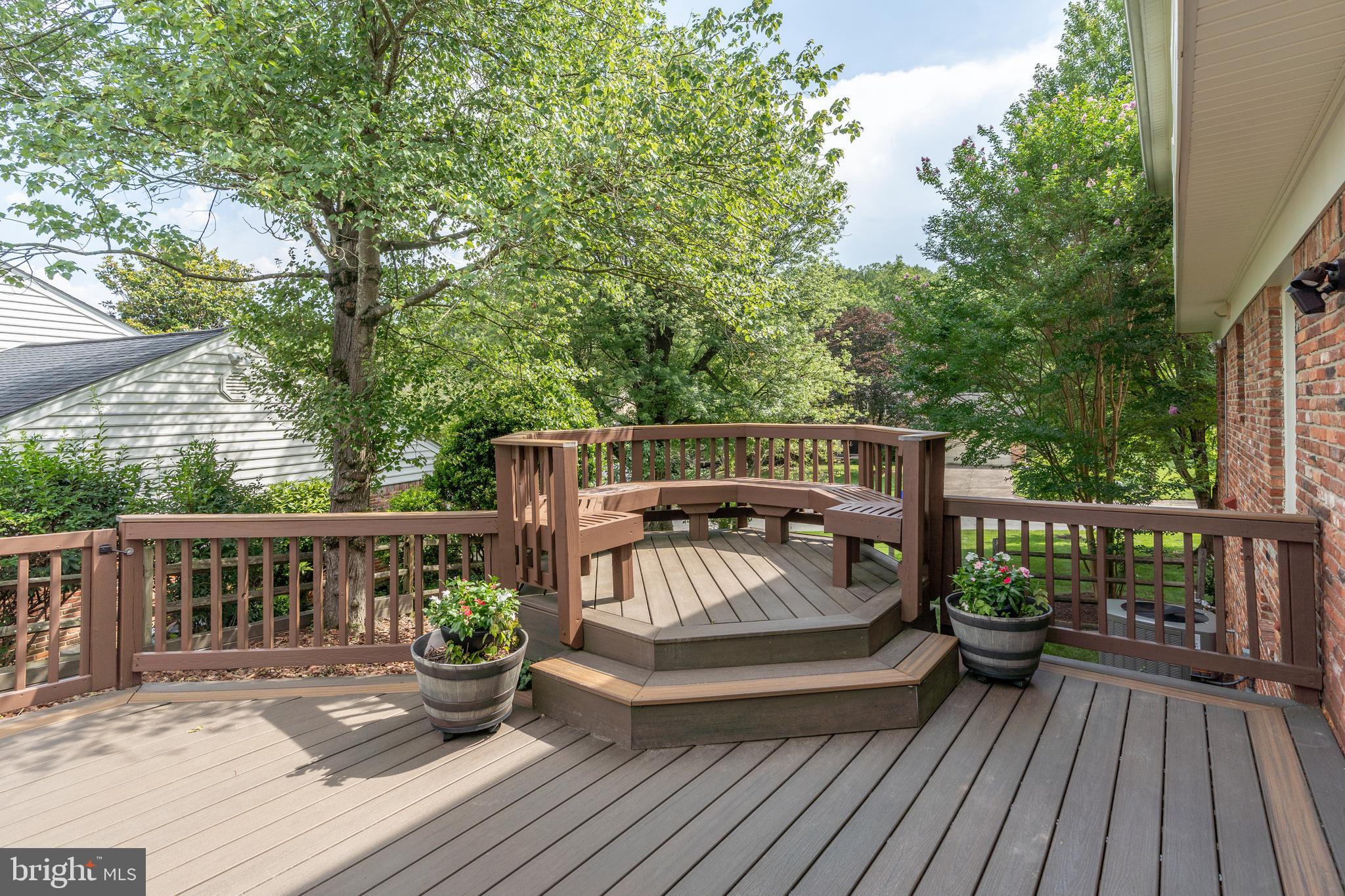 8712 Fox Run Potomac, MD 20854 - Photo 17 of 49 a view of deck with seating space and trees