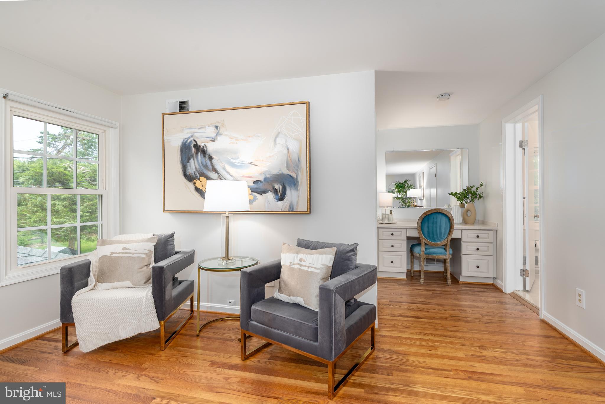 8712 Fox Run Potomac, MD 20854 - Photo 24 of 49 a living room with furniture and a wooden floor