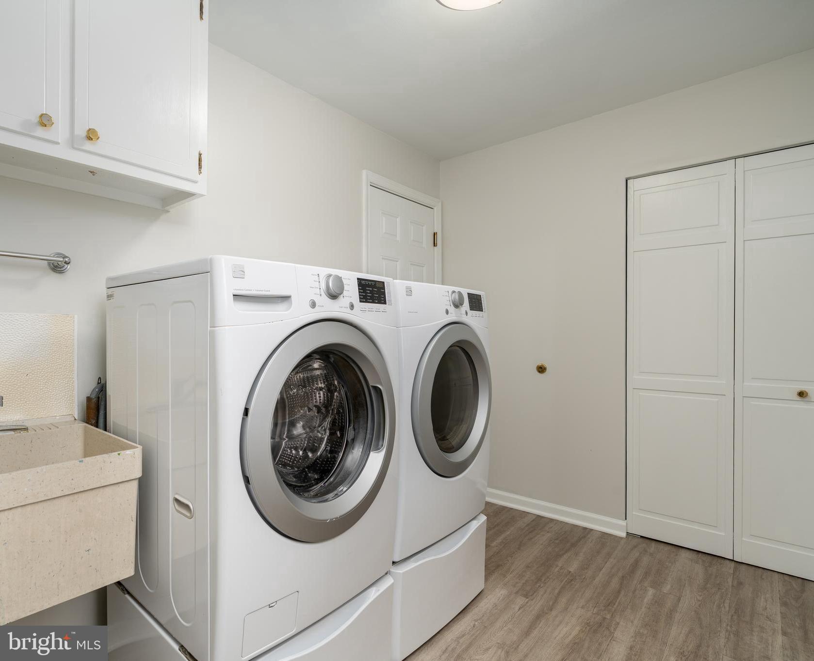 8712 Fox Run Potomac, MD 20854 - Photo 38 of 49 a utility room with dryer and washer