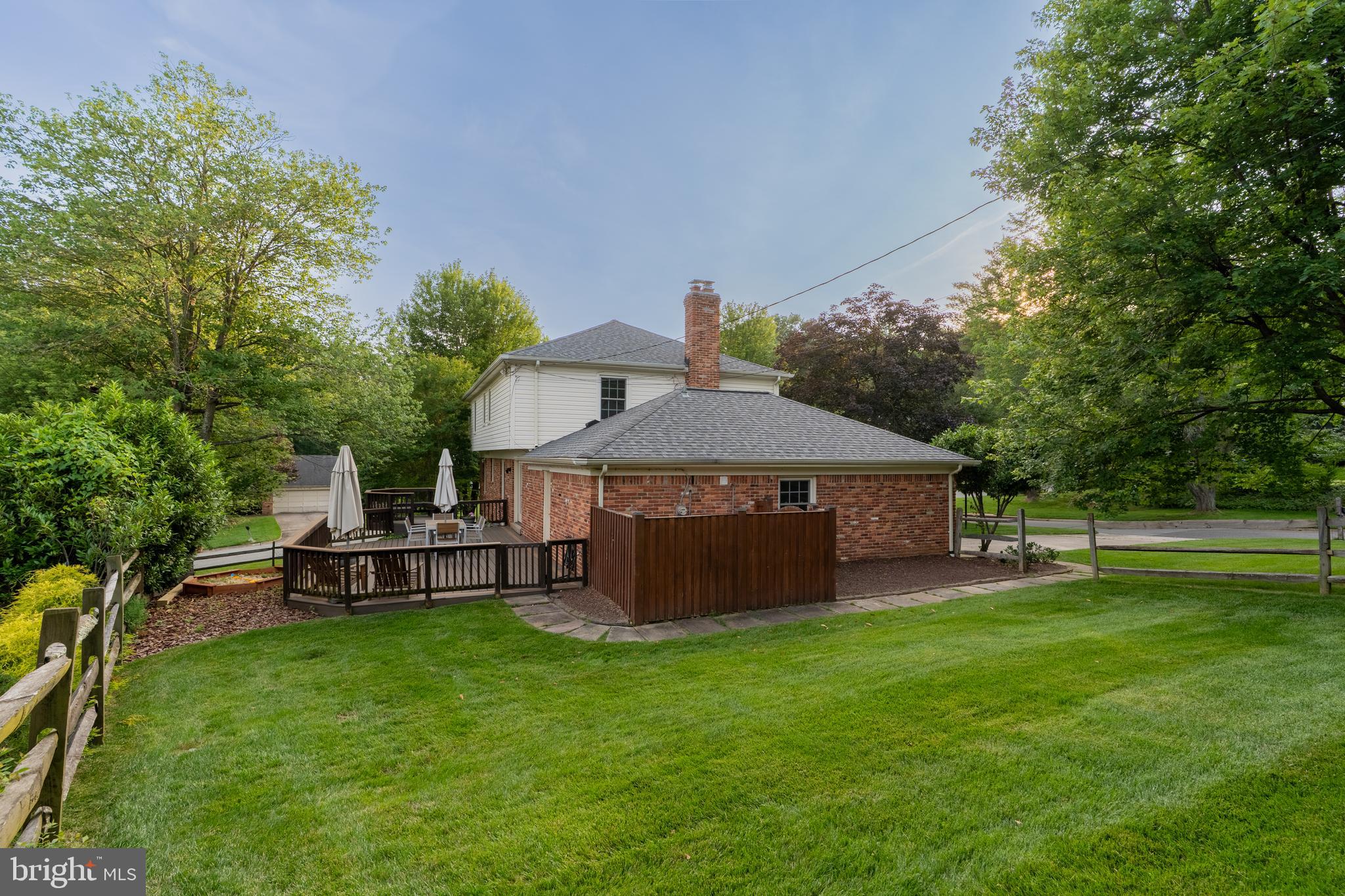 8712 Fox Run Potomac, MD 20854 - Photo 43 of 49 a front view of a house with garden