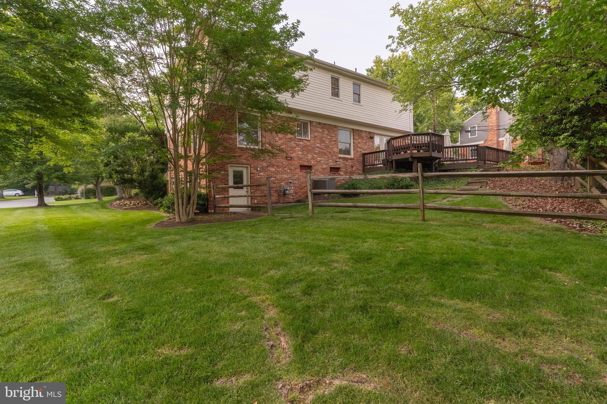 8712 Fox Run Potomac, MD 20854 - Photo 47 of 49 a view of a house with a yard and sitting area