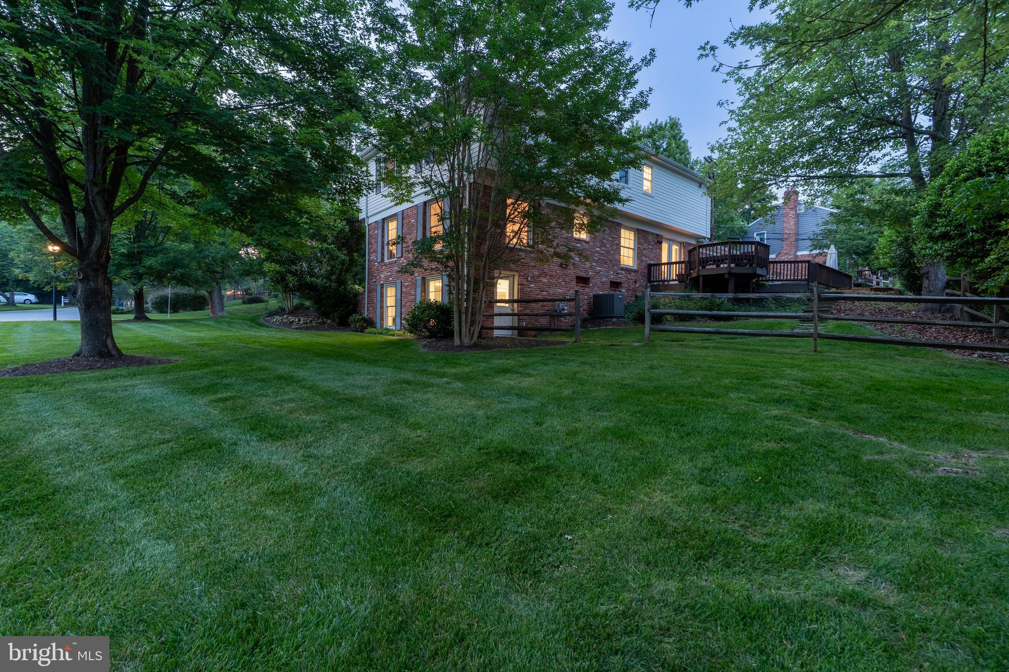 8712 Fox Run Potomac, MD 20854 - Photo 48 of 49 a view of an house with backyard space and balcony