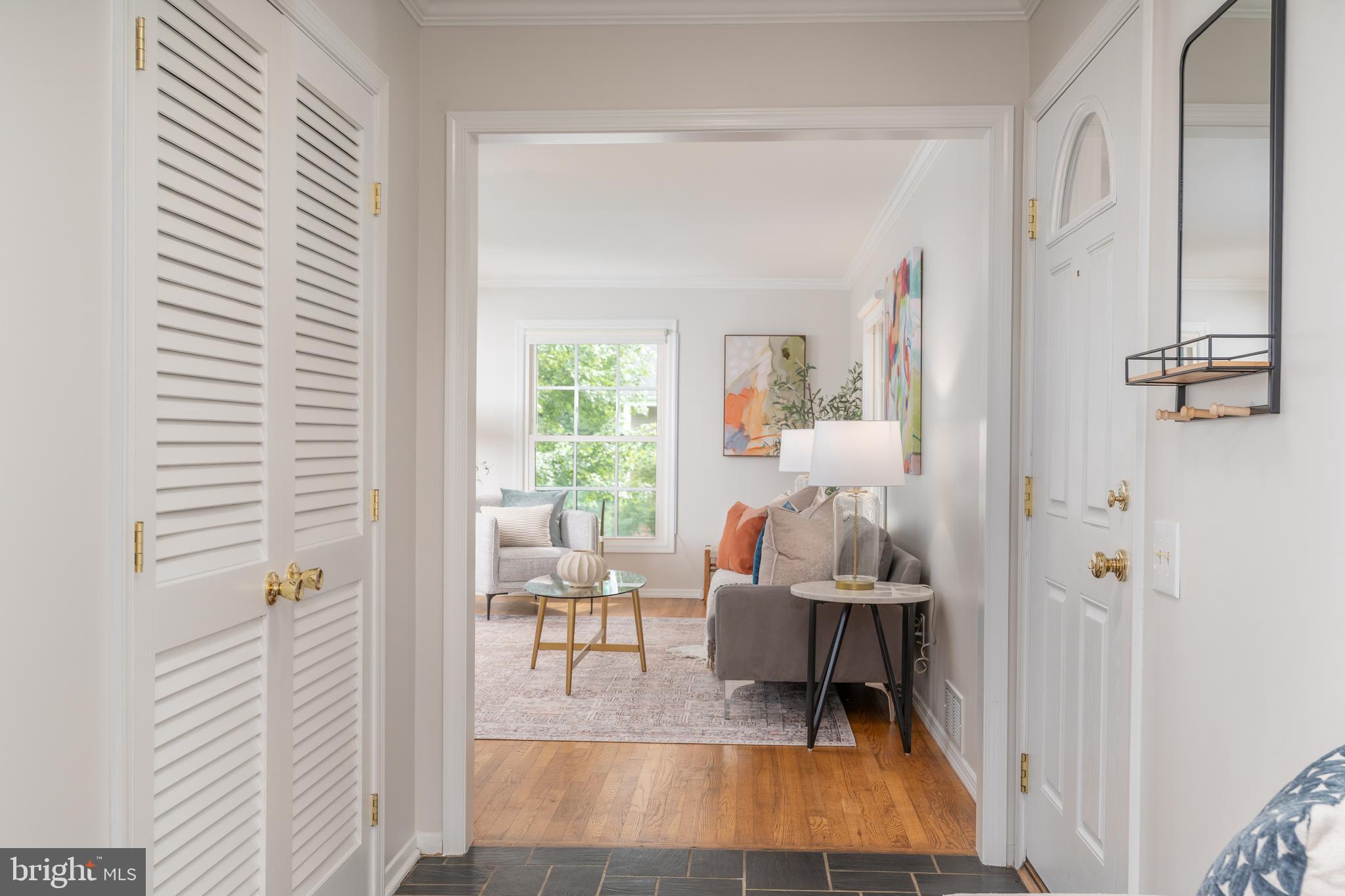 8712 Fox Run Potomac, MD 20854 - Photo 7 of 49 a living room with furniture and a table