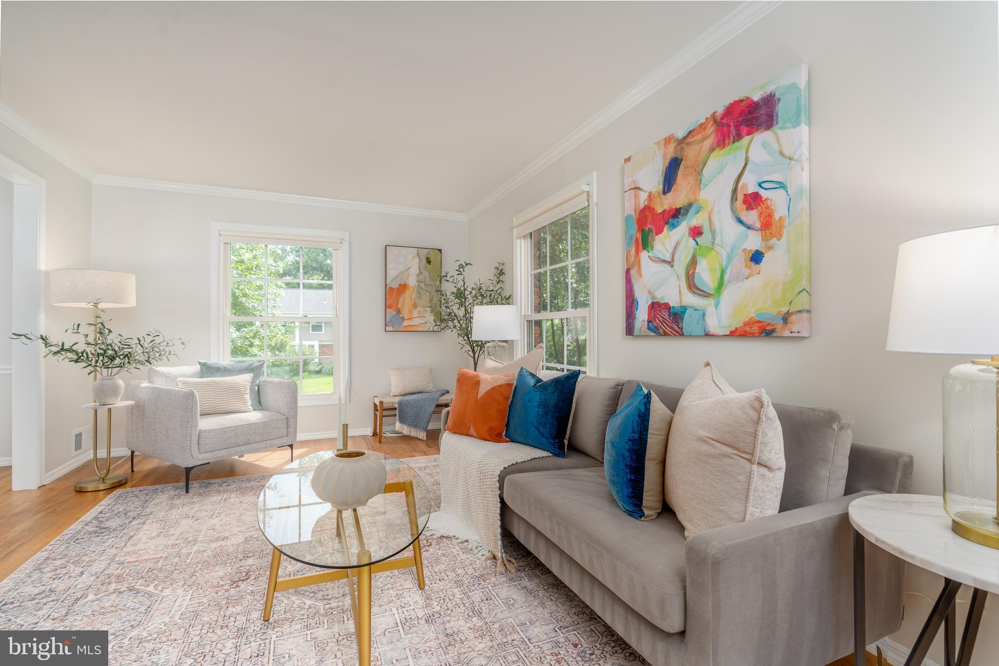 8712 Fox Run Potomac, MD 20854 - Photo 9 of 49 a living room with furniture and a painting on the wall