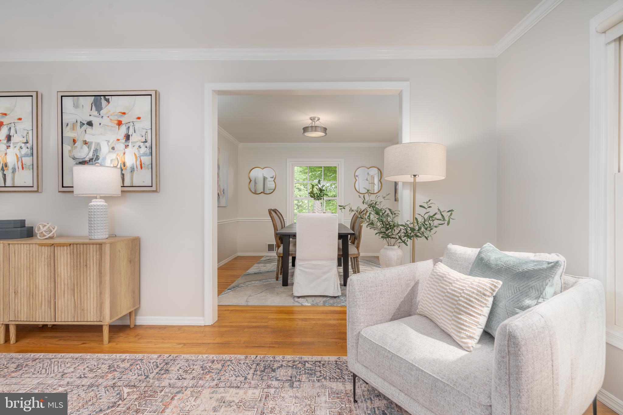 8712 Fox Run Potomac, MD 20854 - Photo 10 of 49 a living room with furniture and wooden floor
