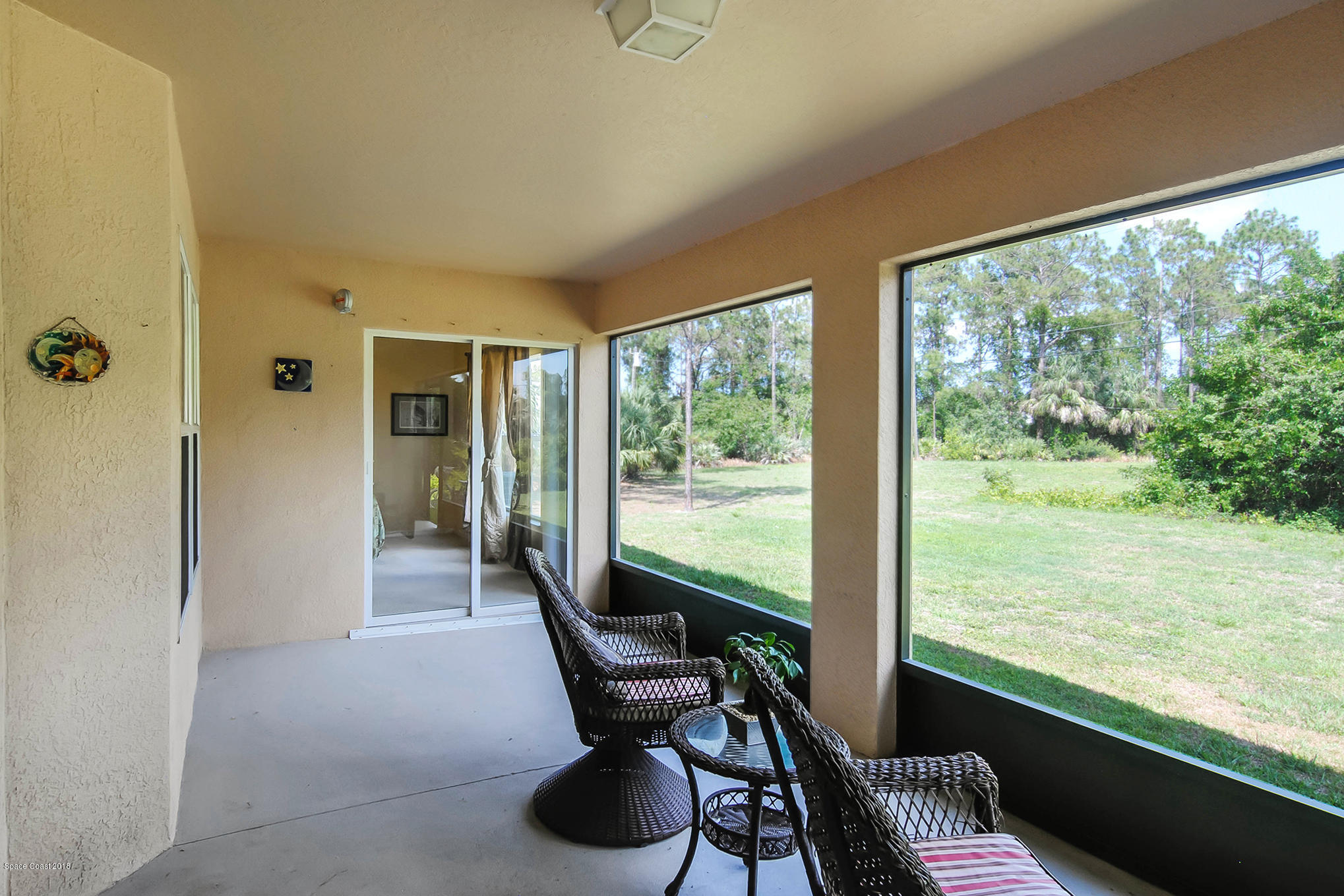 1317 Degroodt Road Southwest Palm Bay, FL 32908 - Photo 24 of 26 a view of a room with a large window