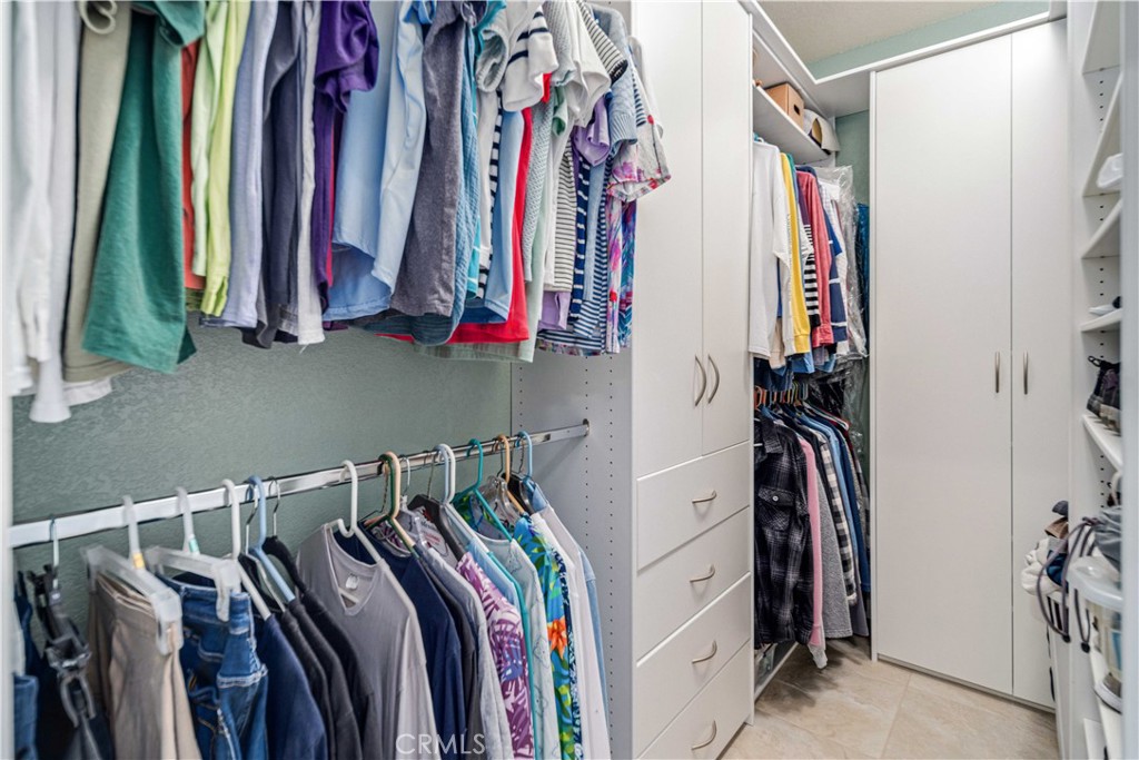 9251 Elizabeth Lake Road Leona Valley, CA 93551 - Photo 27 of 53 a view of walk in closet with clothes
