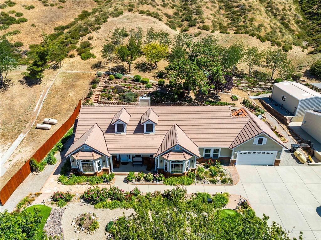 9251 Elizabeth Lake Road Leona Valley, CA 93551 - Photo 50 of 53 an aerial view of a house with a yard