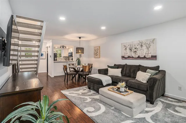 a view of a two chairs in the balcony