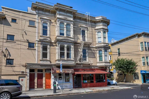 a view of a building with a street
