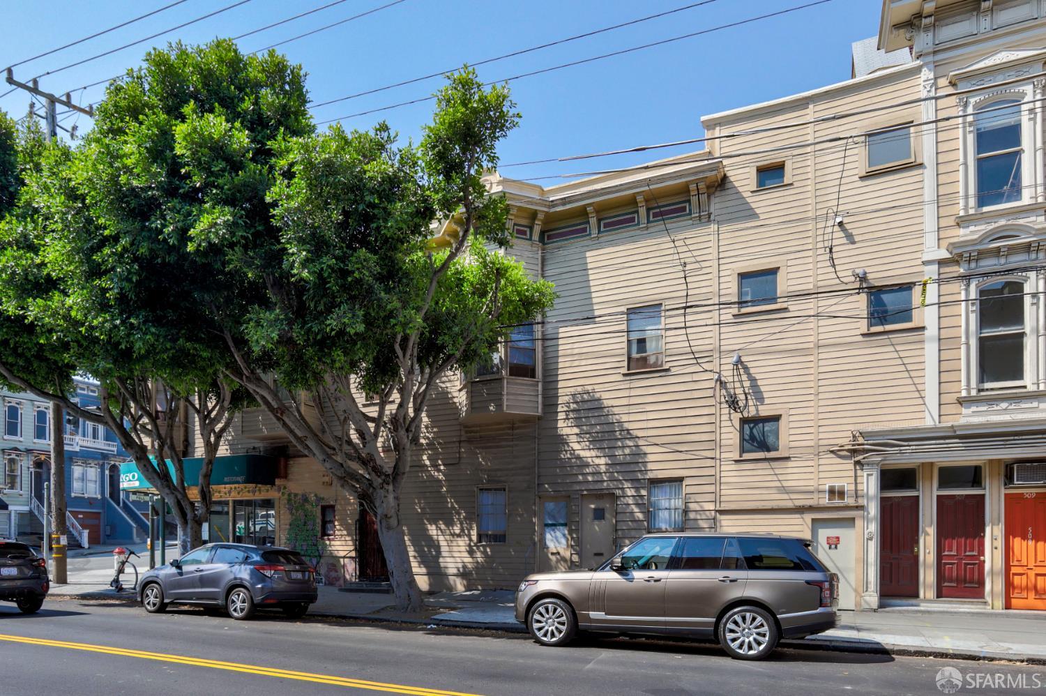 505-511 Laguna Street San Francisco, CA 94102 - Photo 9 of 18 a view of a car parked in front of a house
