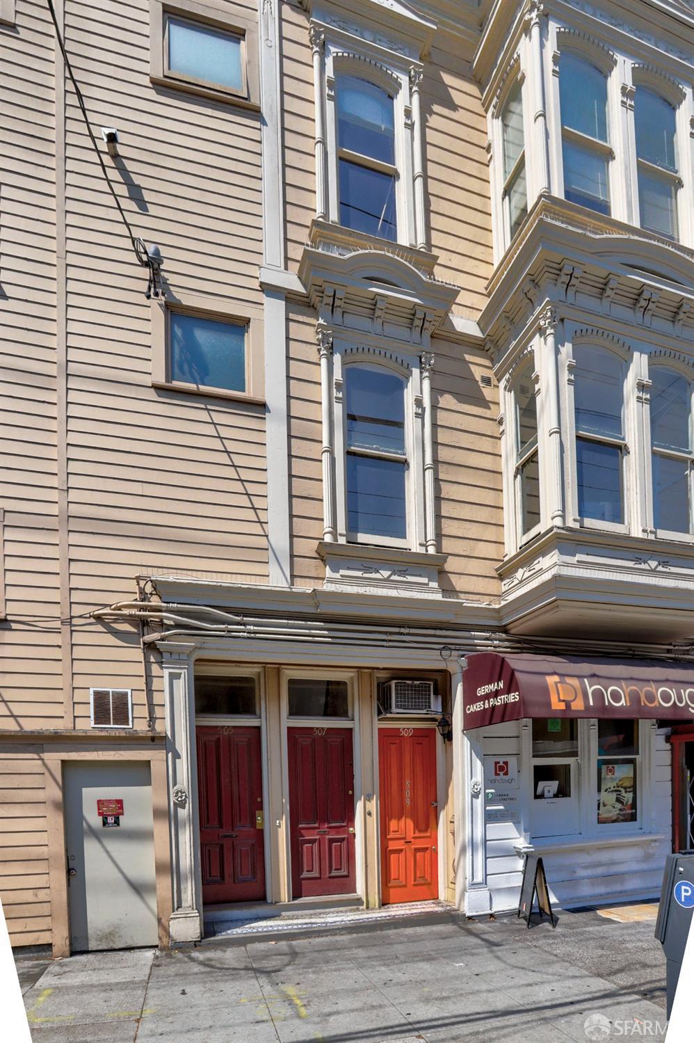 505-511 Laguna Street San Francisco, CA 94102 - Photo 10 of 18 a view of a brick building with many windows