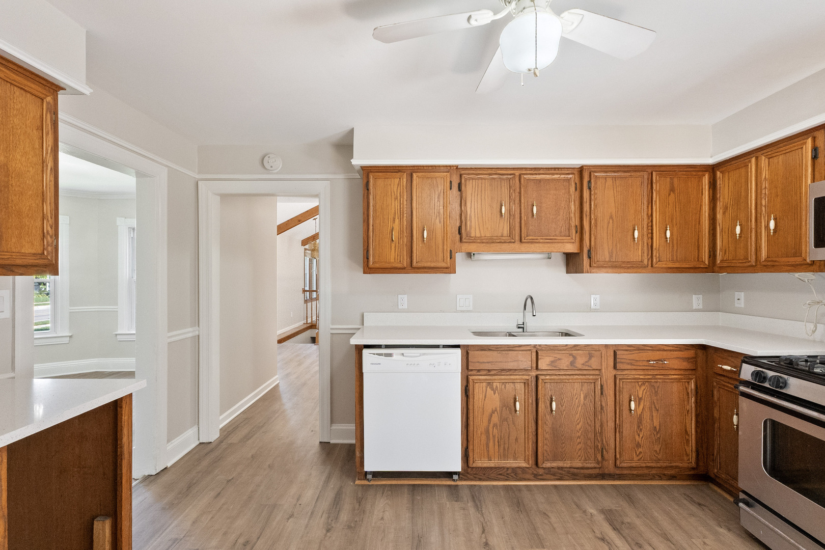 129 South Prairie Street Batavia, IL 60510 - Photo 14 of 45 a kitchen with a sink stove top oven and cabinets