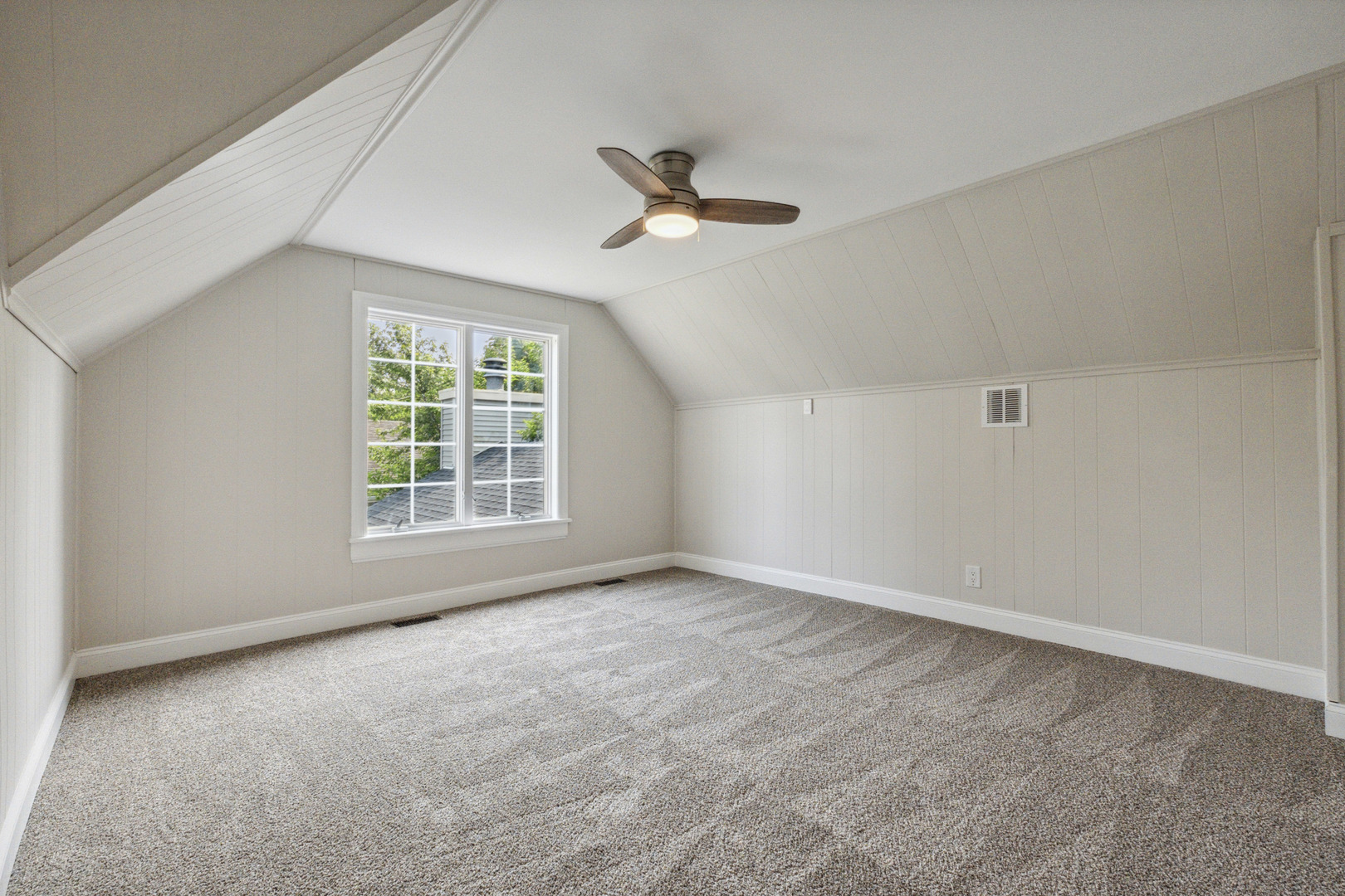 129 South Prairie Street Batavia, IL 60510 - Photo 26 of 45 a view of an empty room with a window