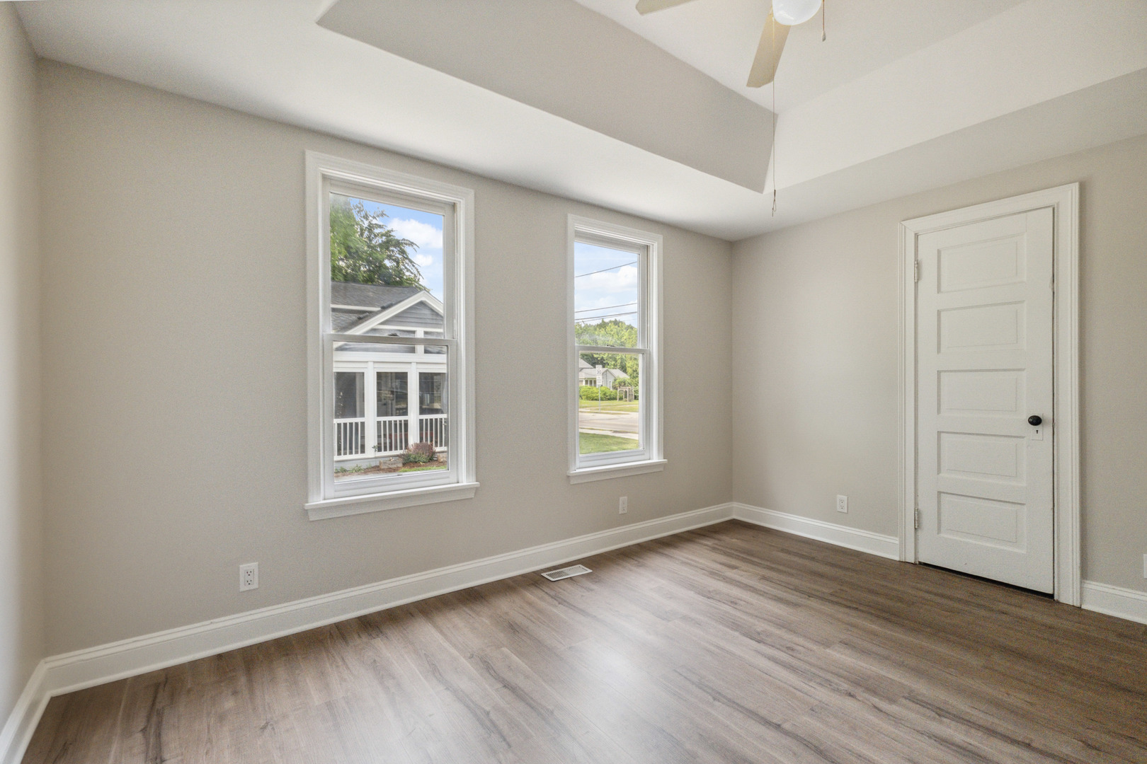 129 South Prairie Street Batavia, IL 60510 - Photo 31 of 45 an empty room with wooden floor and windows