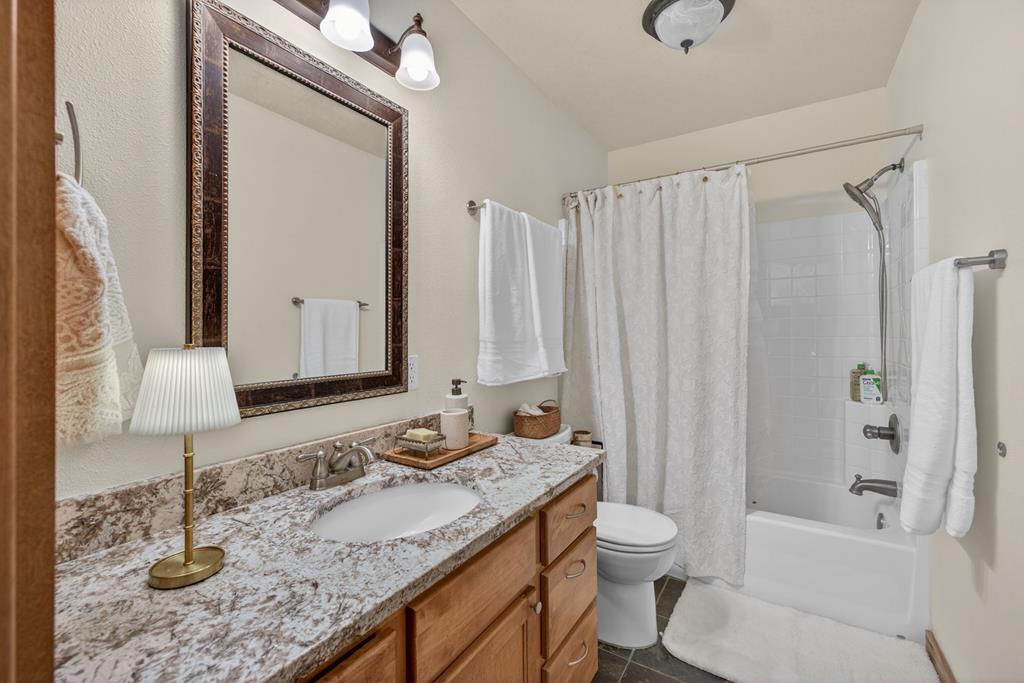 31 Eagle Trail Cascade, ID 83611 - Photo 31 of 50 The guest bath upstaris , Remodeld with granite counters, new lighting and new floors,