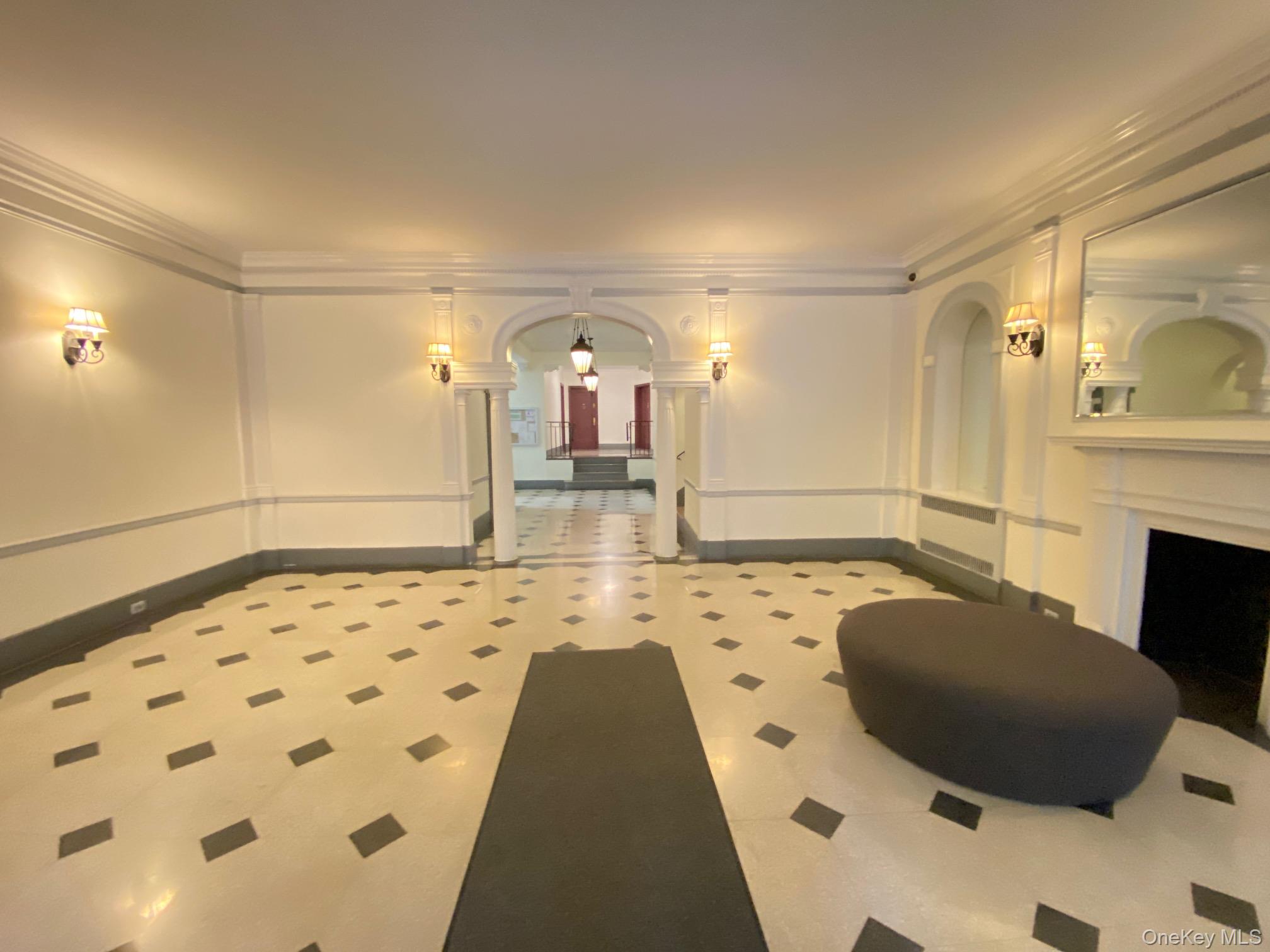 79-15 35th Avenue, Unit 3C Queens, NY 11372 - Photo 2 of 13 Common area with ornamental molding