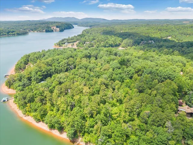 a view of a lake from a balcony