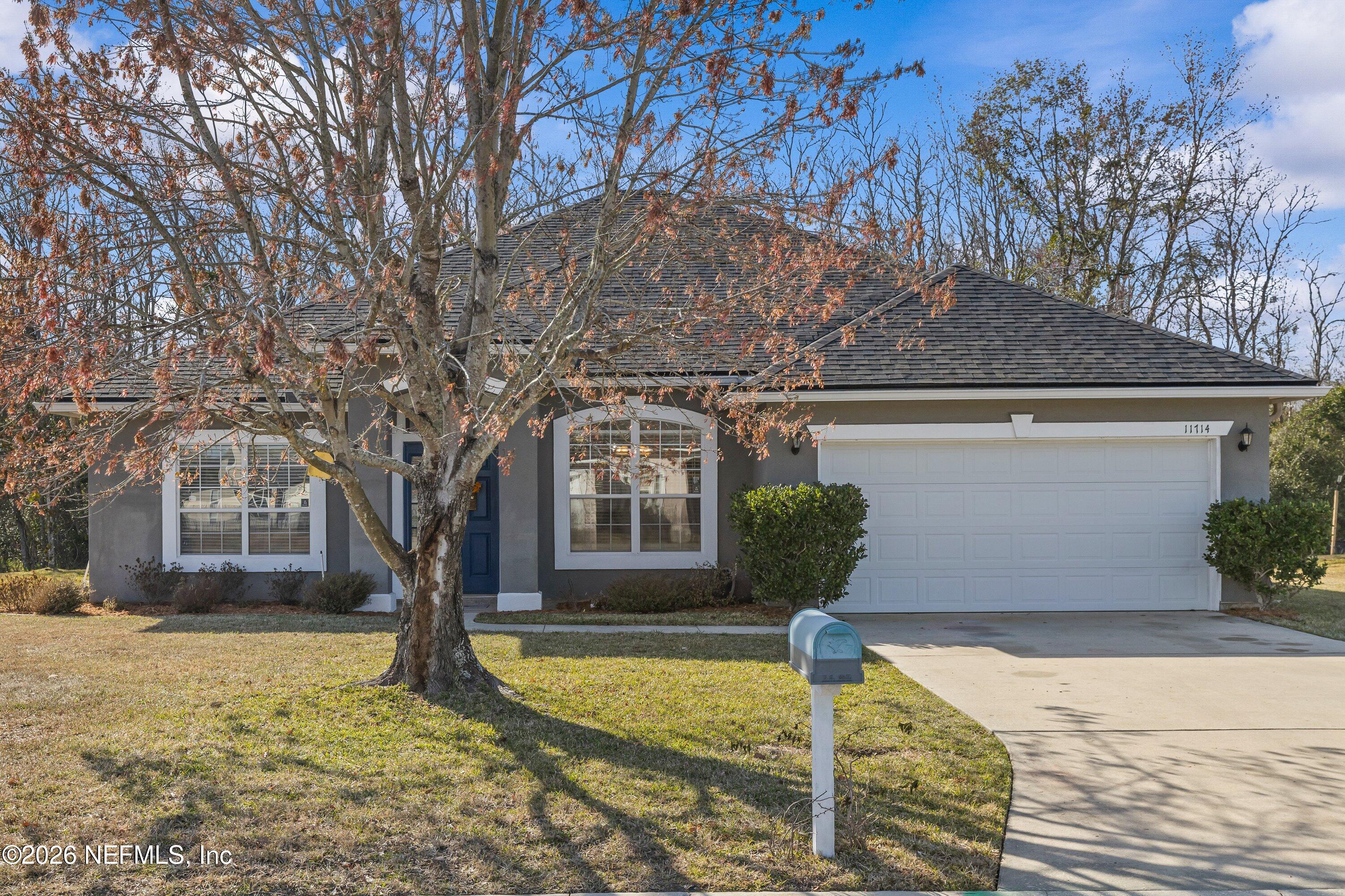 11714 Raindrop Road Jacksonville, FL 32219 - Photo 1 of 31 01-WeGoFar_11714RaindropRd_001