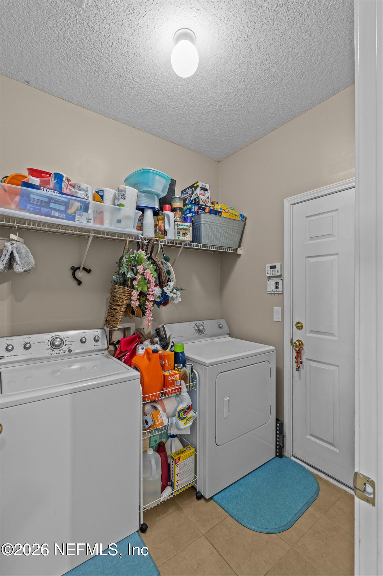 11714 Raindrop Road Jacksonville, FL 32219 - Photo 19 of 31 Indoor Laundry