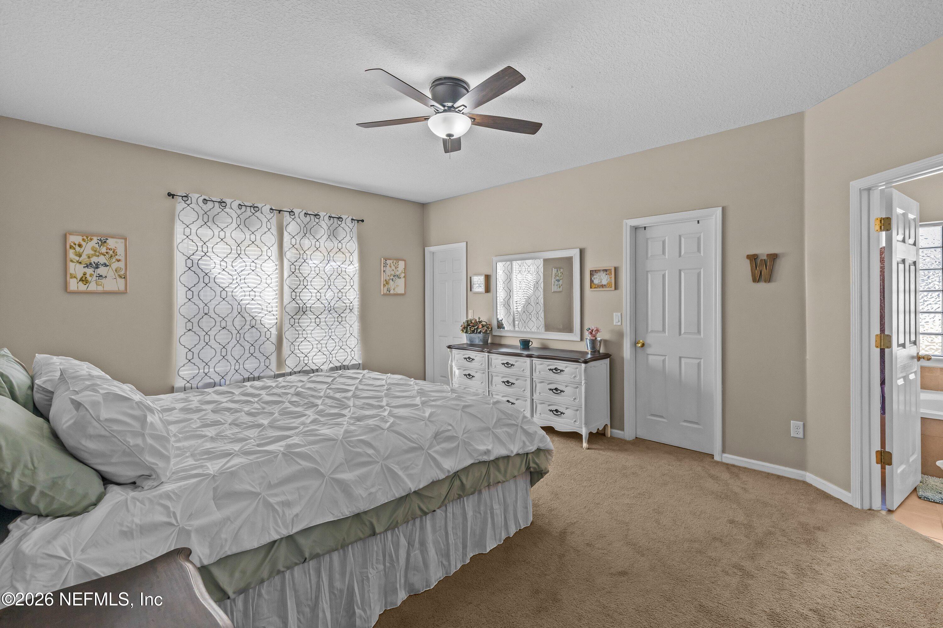 11714 Raindrop Road Jacksonville, FL 32219 - Photo 20 of 31 Master bedroom