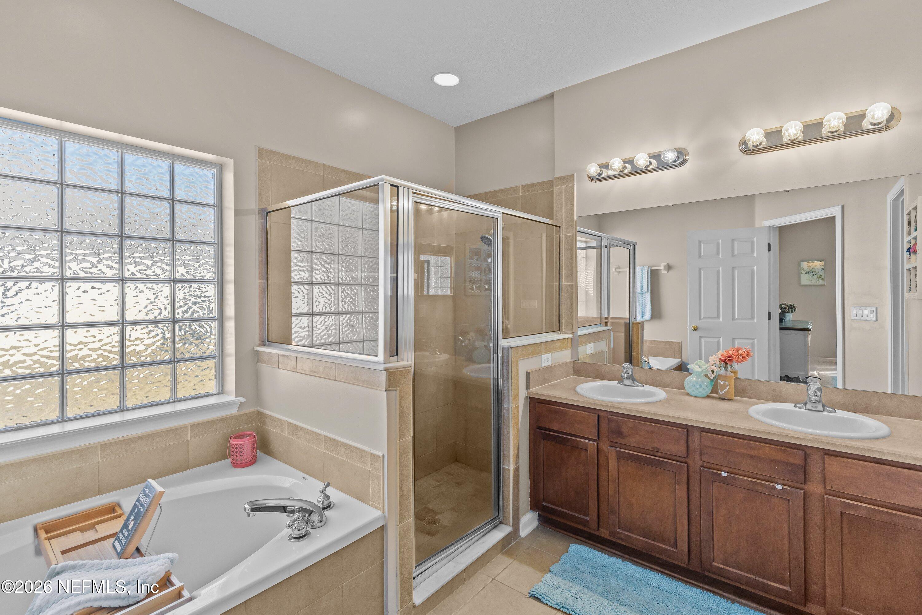 11714 Raindrop Road Jacksonville, FL 32219 - Photo 22 of 31 Master bathroom