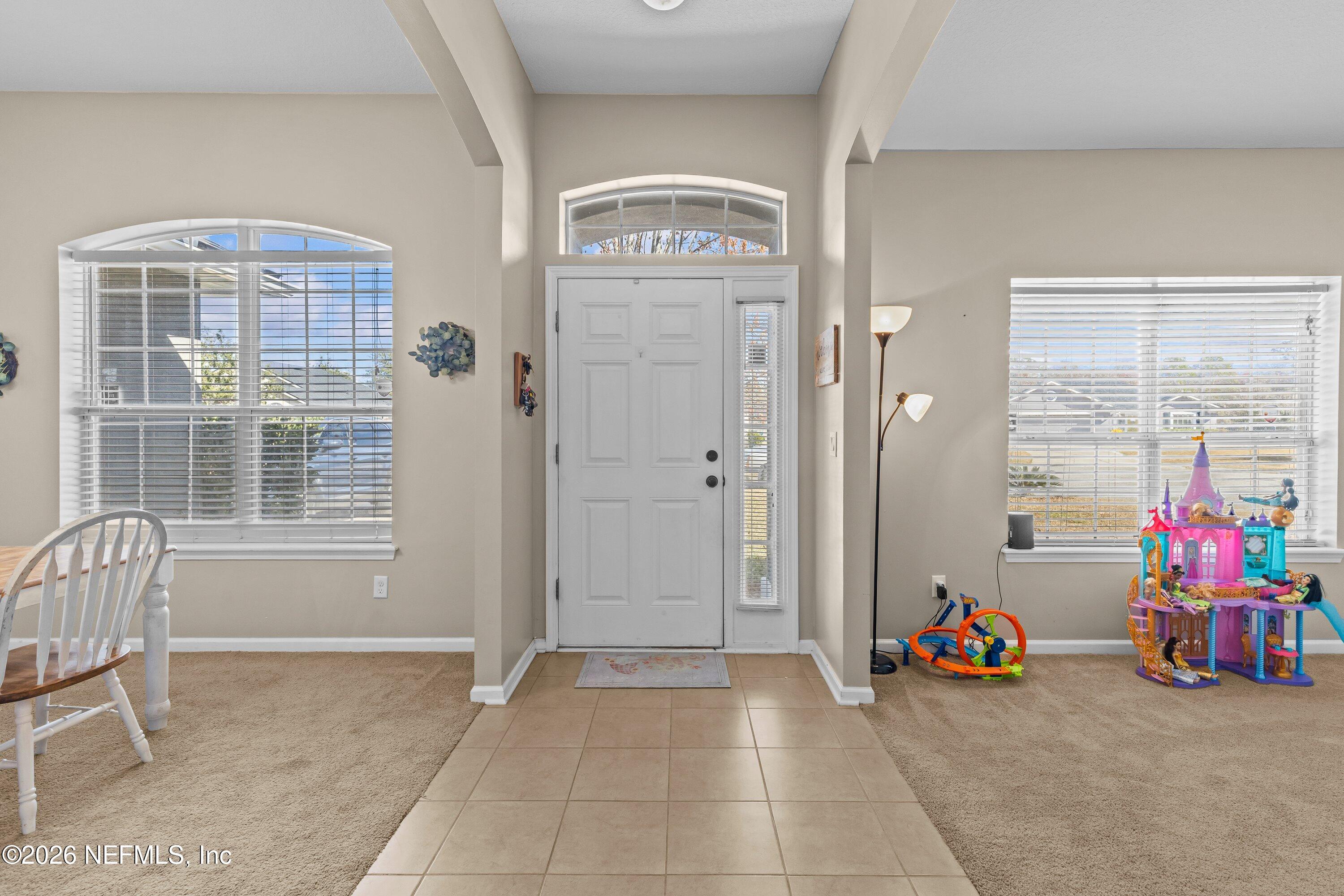 11714 Raindrop Road Jacksonville, FL 32219 - Photo 4 of 31 08-WeGoFar_11714RaindropRd_008