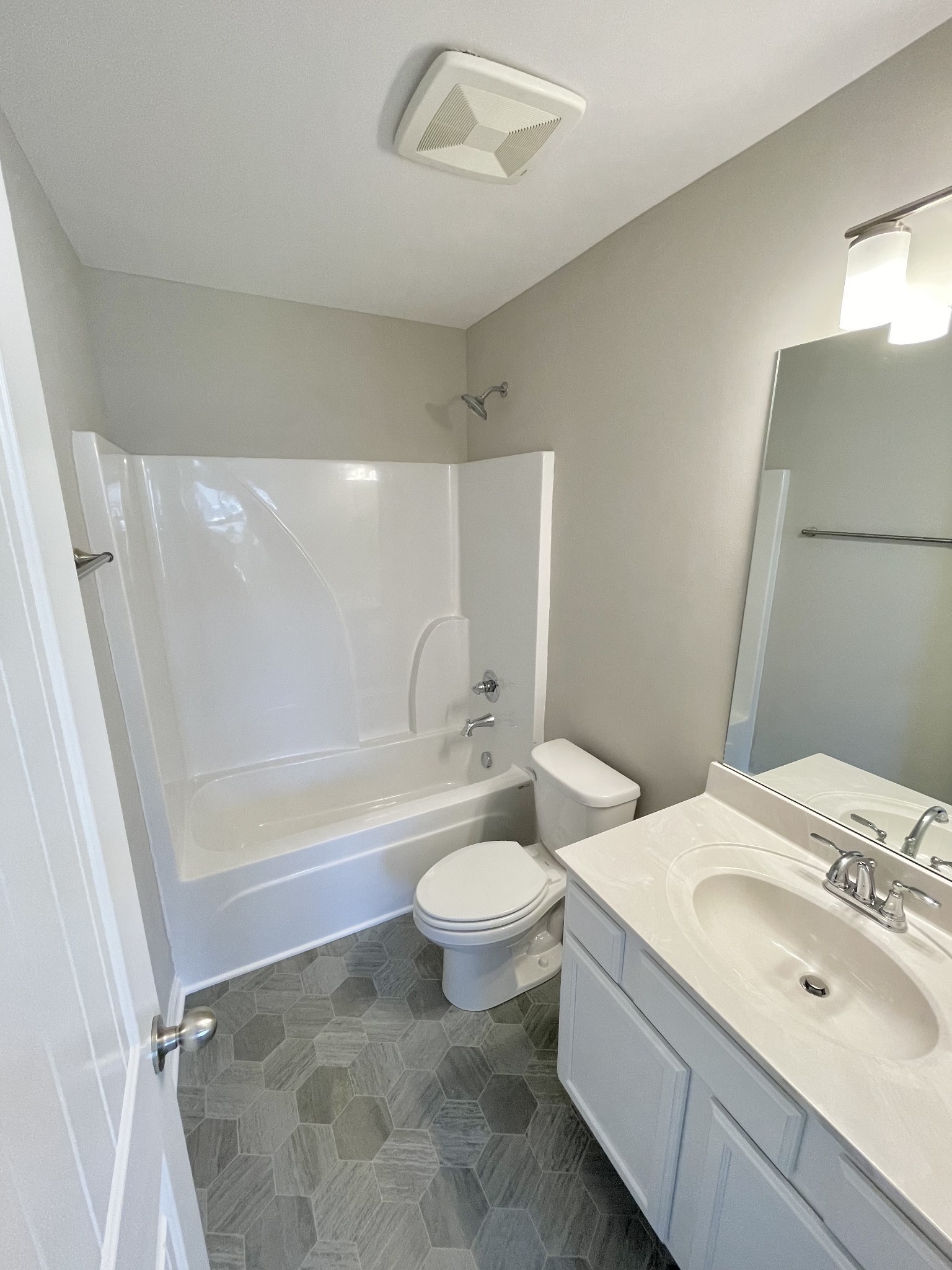 175 Addi Street Pleasant View, TN 37146 - Photo 10 of 13 a bathroom with a sink a toilet and shower