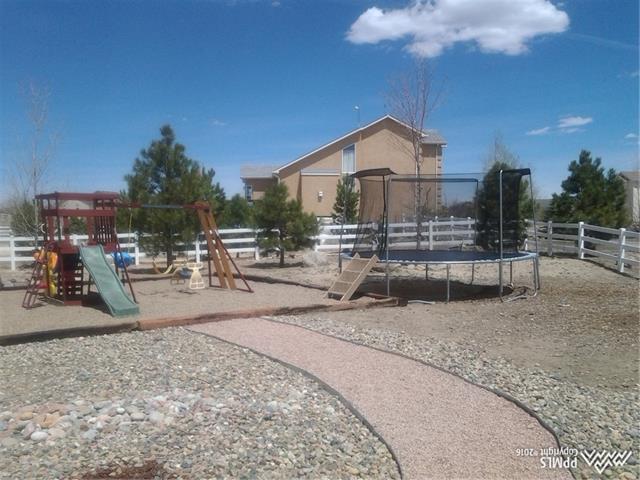 8262 Fort Smith Road Peyton, CO 80831 - Photo 6 of 24 Back yard play space