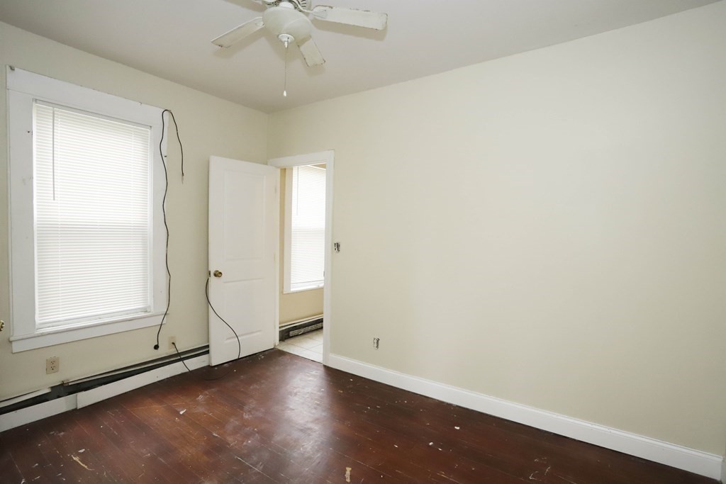 934 Middle Street Fall River, MA 02721 - Photo 11 of 30 wooden floor in an empty room