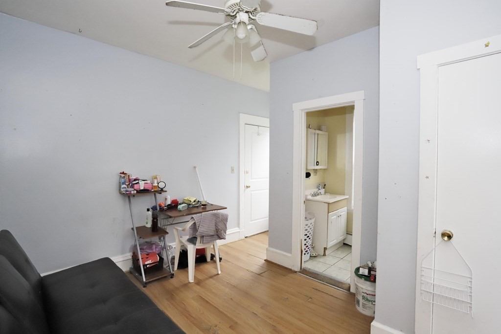 934 Middle Street Fall River, MA 02721 - Photo 20 of 30 a view of a workspace with furniture and wooden floor