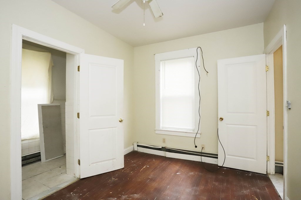 934 Middle Street Fall River, MA 02721 - Photo 8 of 30 an empty room with windows and closet