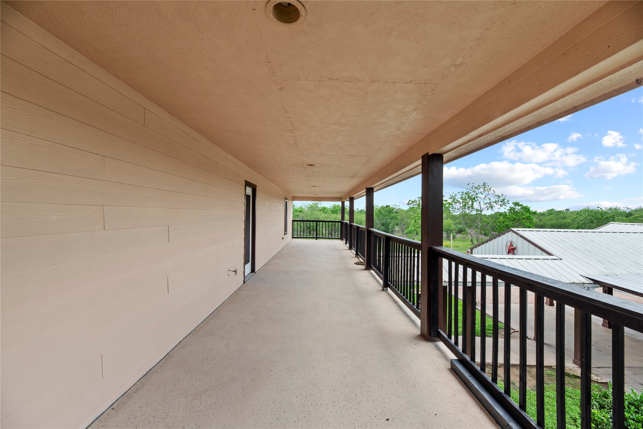 523 Moore Bar Road Rosenberg, TX 77471 - Photo 18 of 50 This is the full length balcony on the second floor.