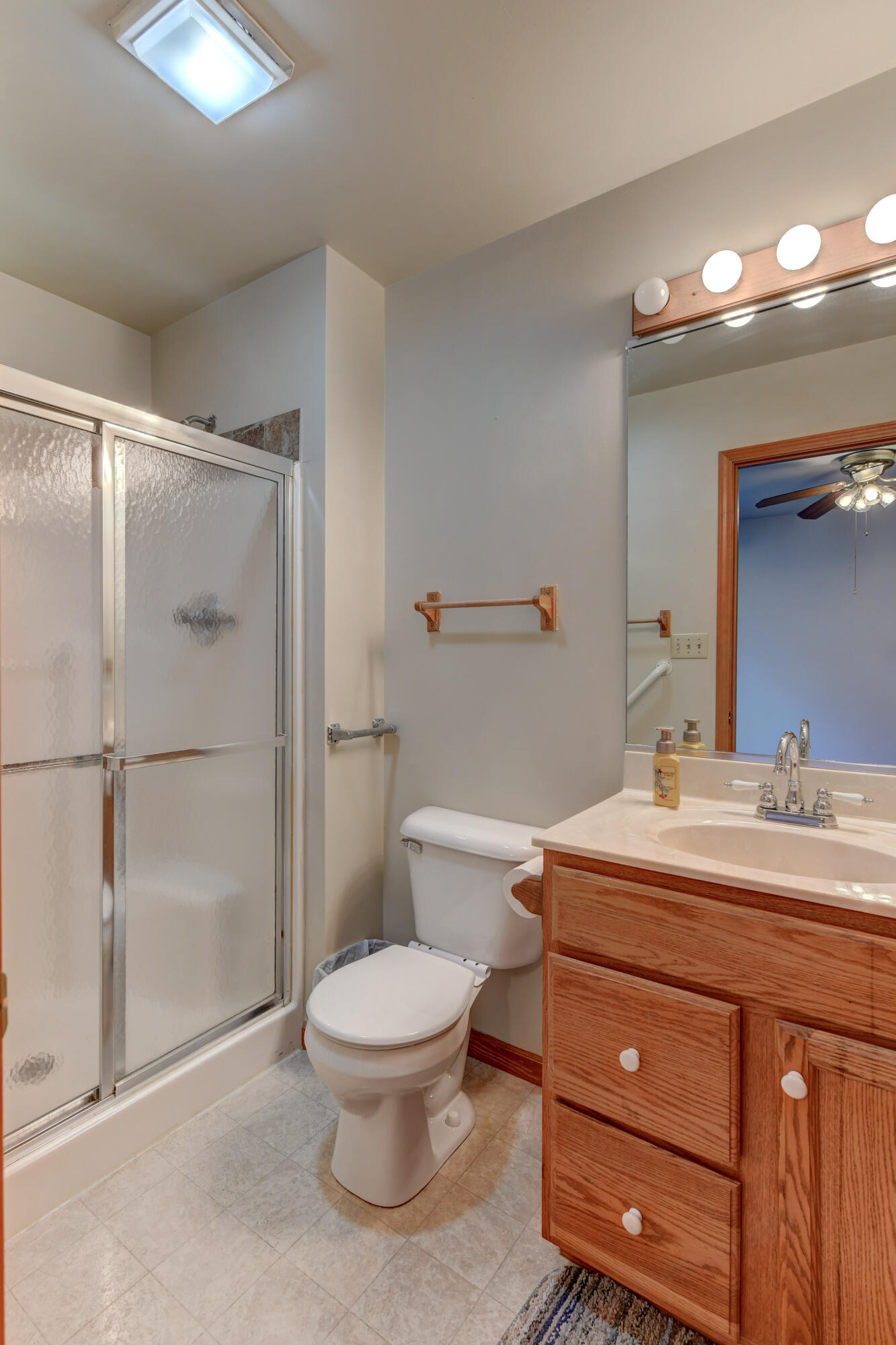 2626 41st Place Highland, IN 46322 - Photo 7 of 24 a bathroom with a sink a toilet a mirror and shower