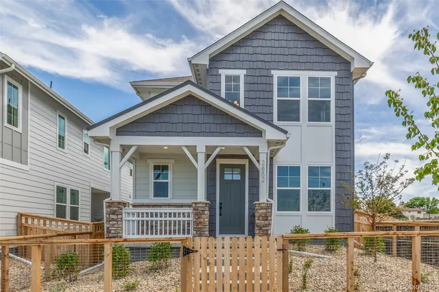 a front view of a house with a porch