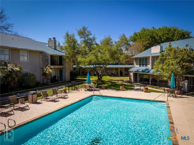 a bathroom with a sink and a shower