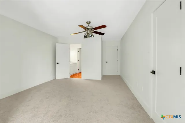 a view of a room with a large window