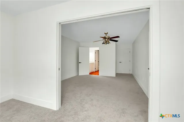 a bathroom with a sink a mirror and a shower