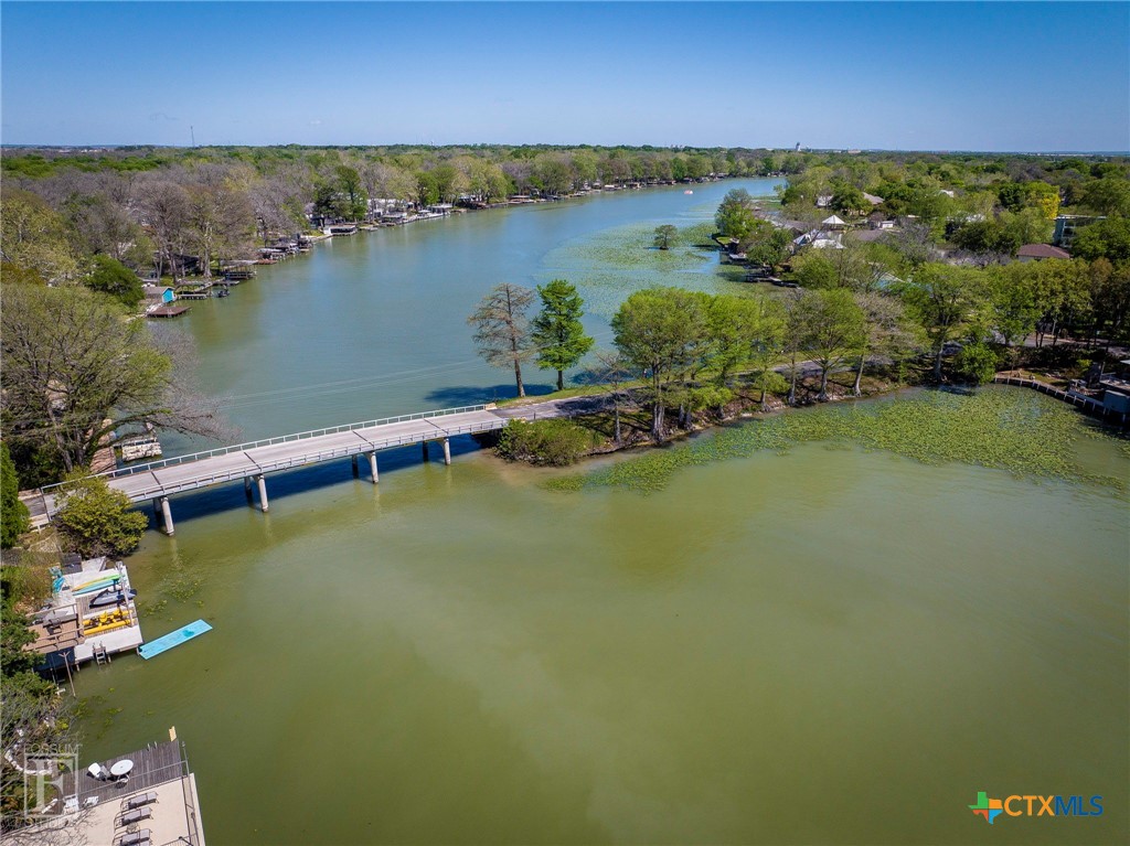 551 Terminal Loop Road, Unit B3 McQueeney, TX 78123 - Photo 4 of 13 an aerial view of a houses with a lake view